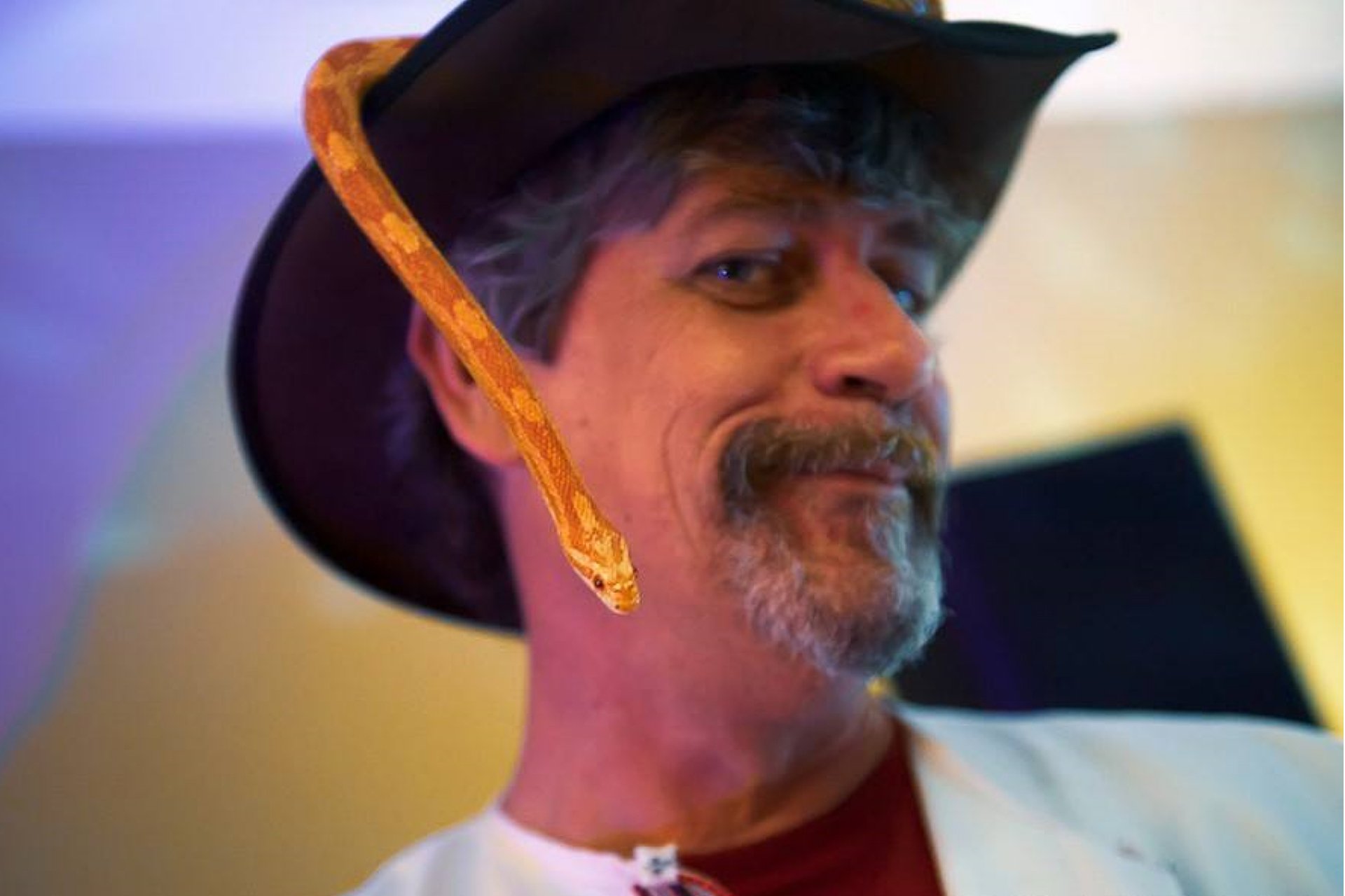 Daryl Sprout in a theatrical reptile show moment