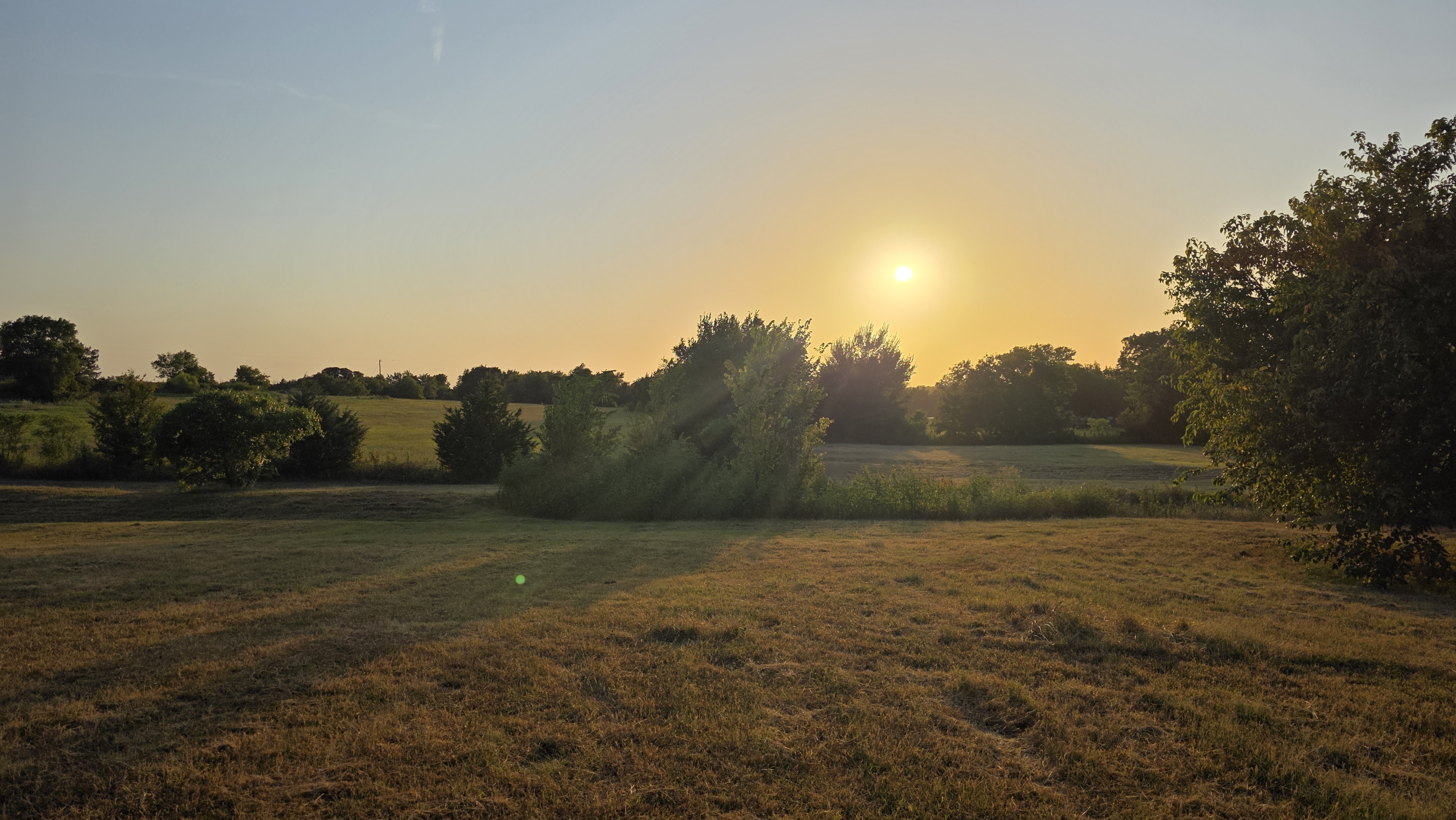 Sunset across the open Cooke County fields