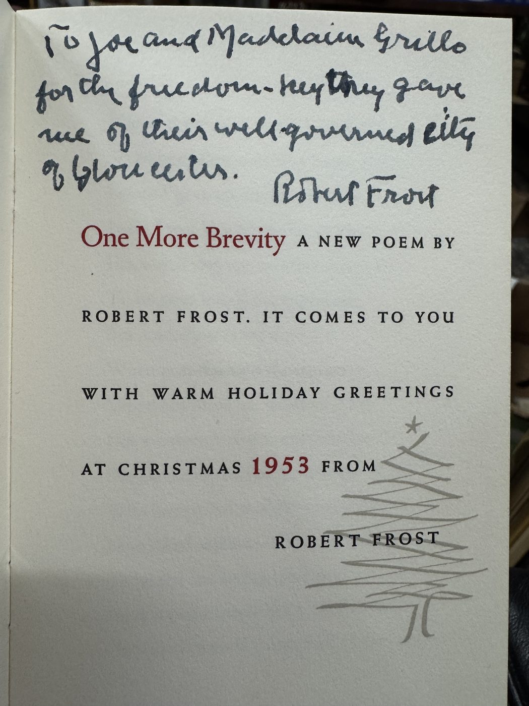 Robert Frost holiday poem with a handwritten inscription and signature