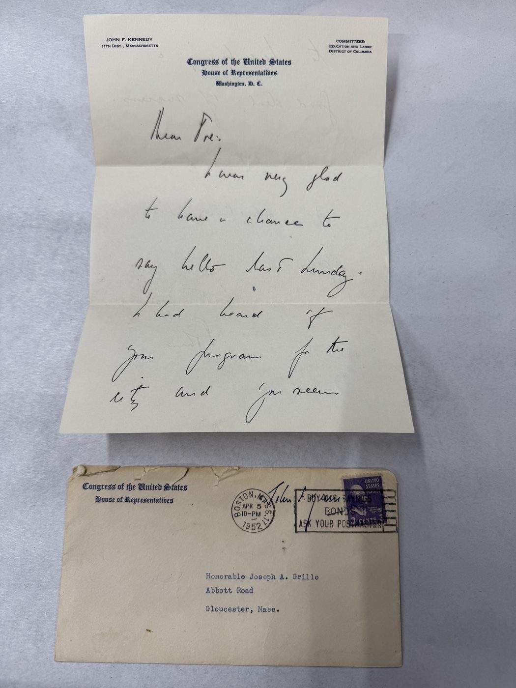 Historic handwritten correspondence and a mailed envelope