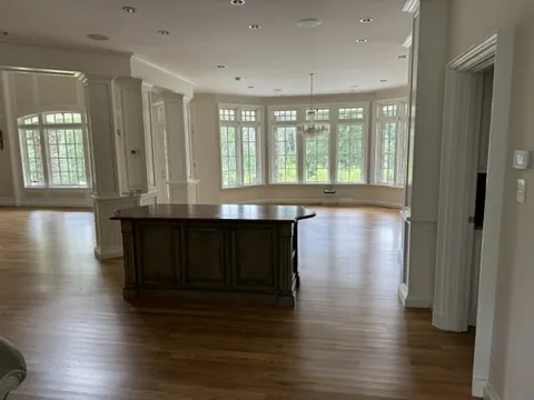 A sunlit room in an estate ready for sorting and evaluation