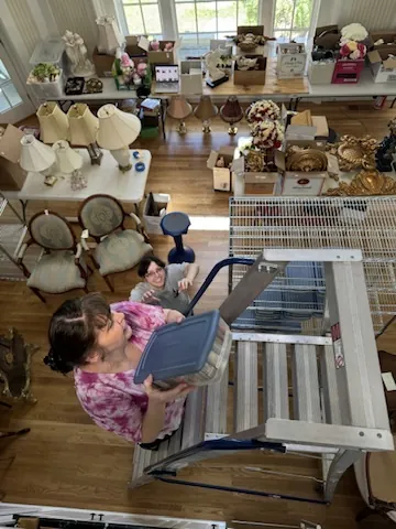 A worker preparing an estate interior for the next stage of the process