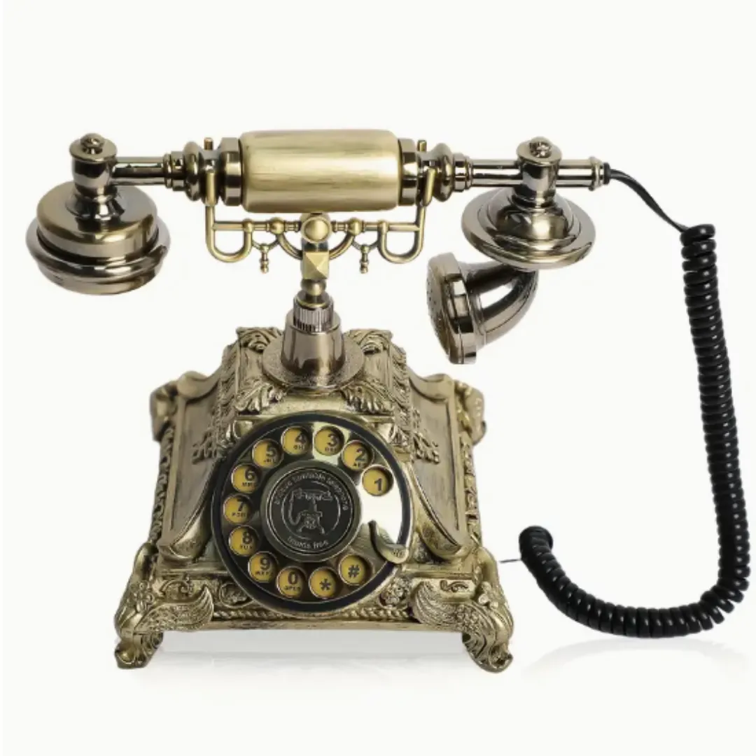 The Antique ornate brass rotary guestbook phone