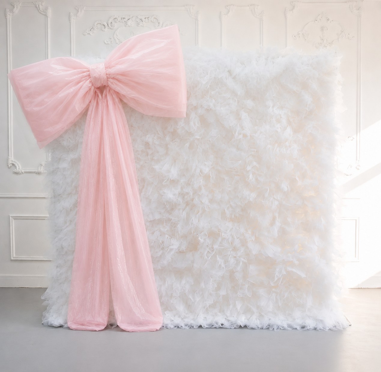 Pink Bow Tulle Wall backdrop available from The Pose Garden