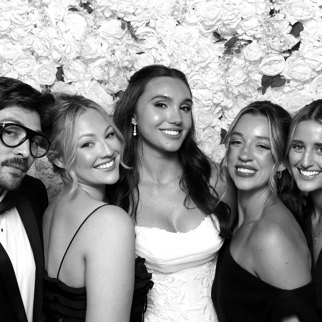 Wedding guests posing for black-and-white glam photos at a Phoenix wedding