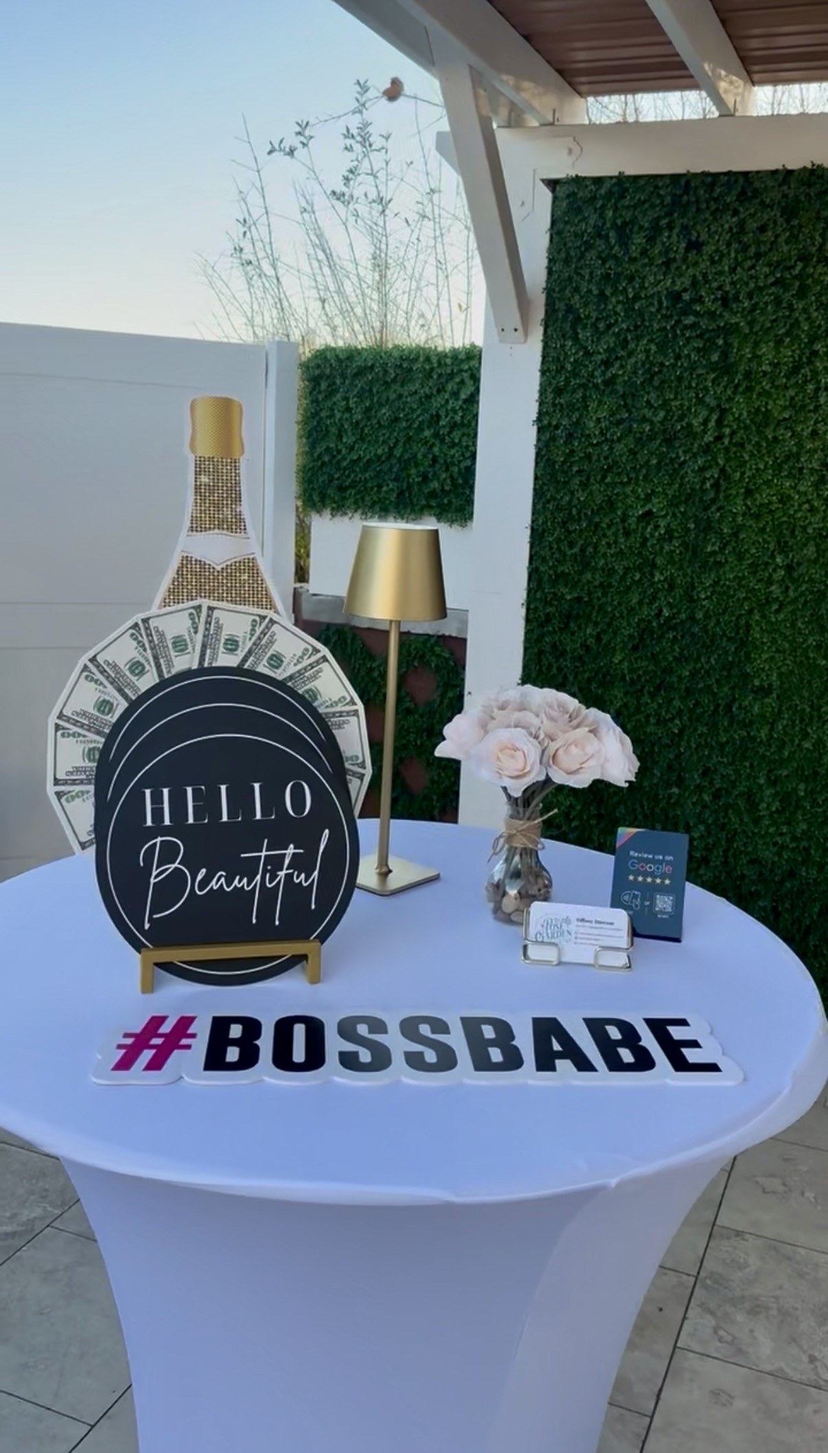 #BOSSBABE and champagne bottle photo booth props displayed for the Women to KNOW in Arizona Black Tie Gala