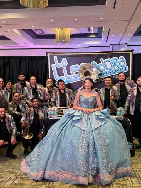 Quinceañera in a blue formal gown at a Phoenix-area quinceañera expo