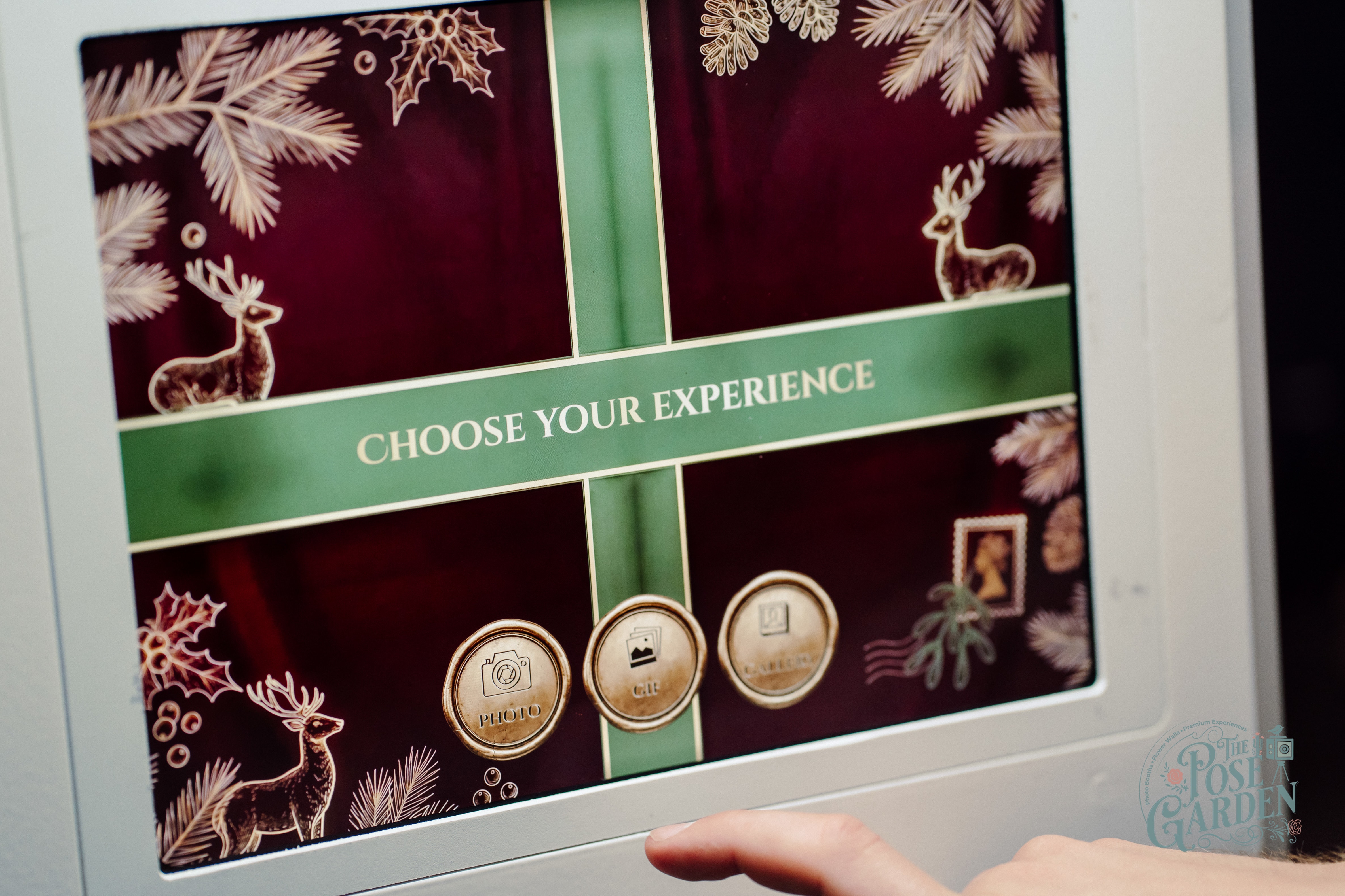 Festive holiday event guests choosing their Photo Booth experience