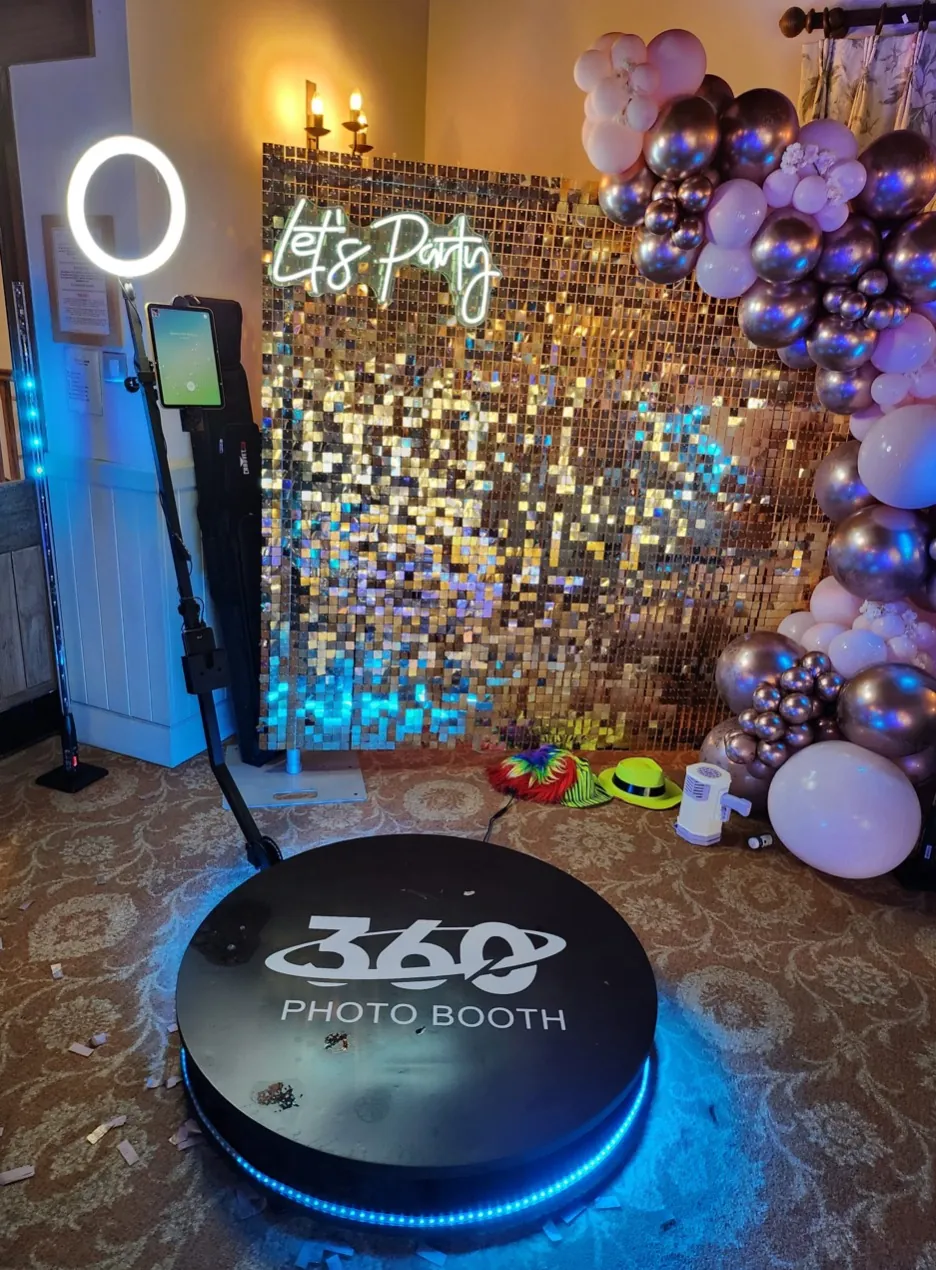 Wedding guests enjoying The Pose Garden 360 Video Booth in Phoenix.
