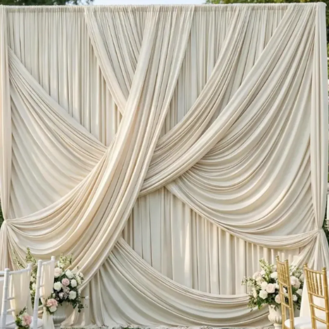 Dramatic cream drapery event backdrop