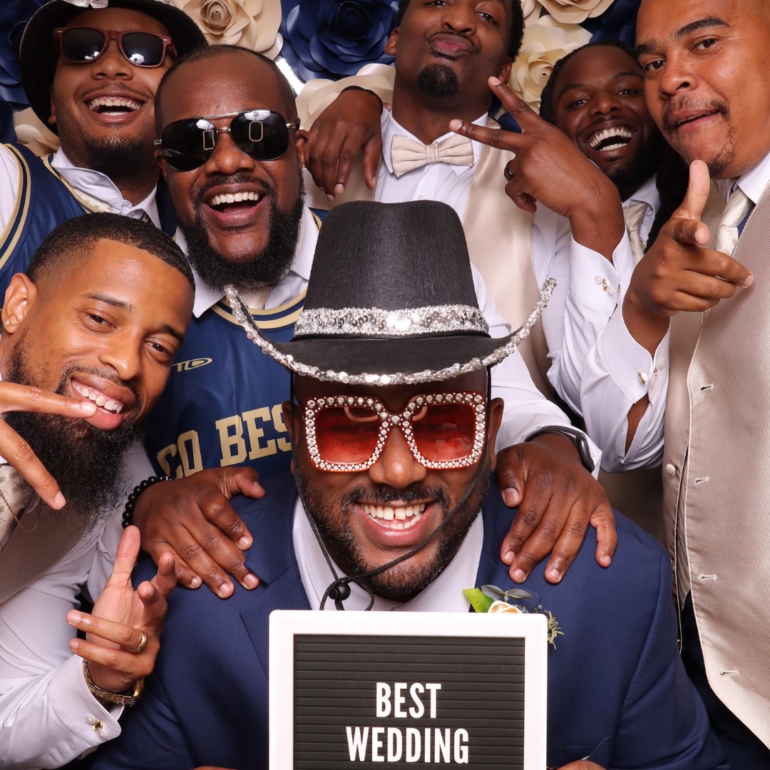 Wedding party enjoying a photo booth moment