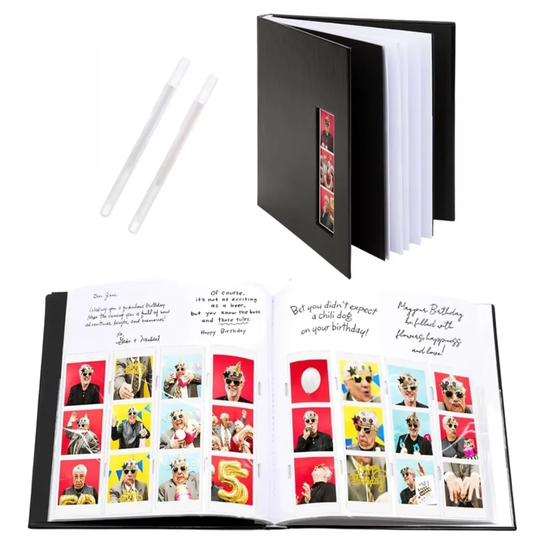 Black photo guestbook album with white pens and photo booth print pages