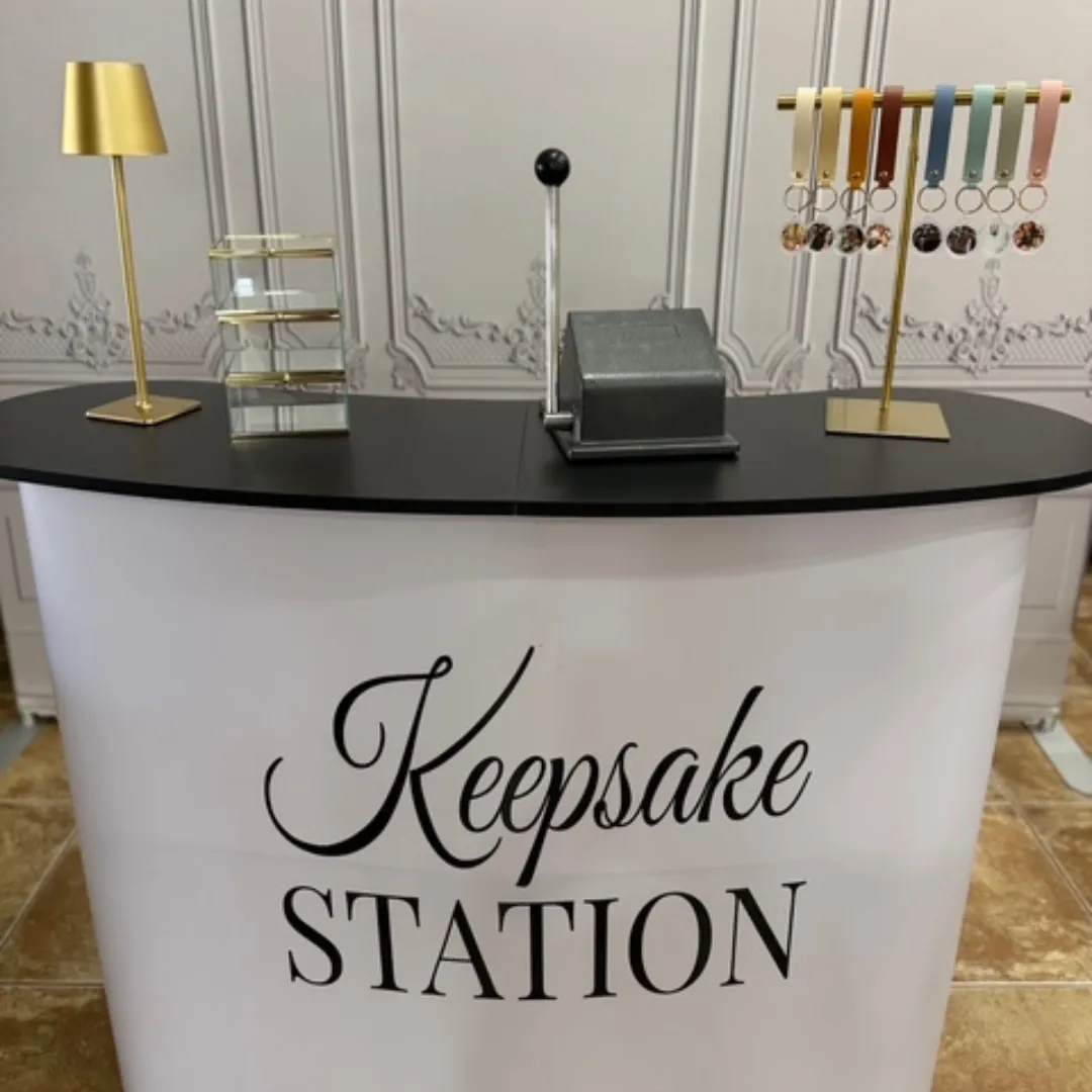 Keepsake station with a custom keychain display at an event