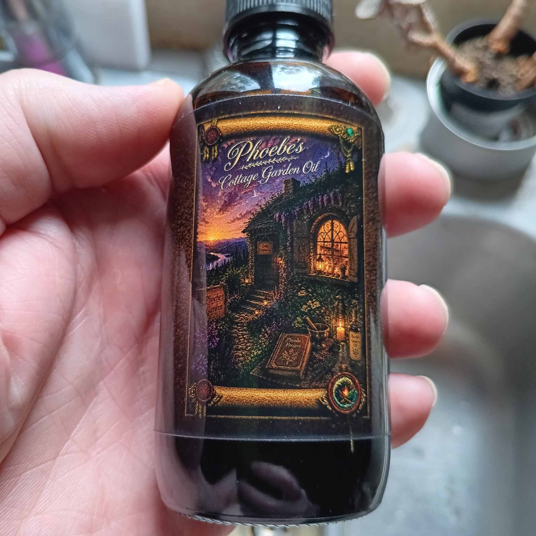 Phoebe’s Cottage Garden Oil in an amber glass dropper bottle