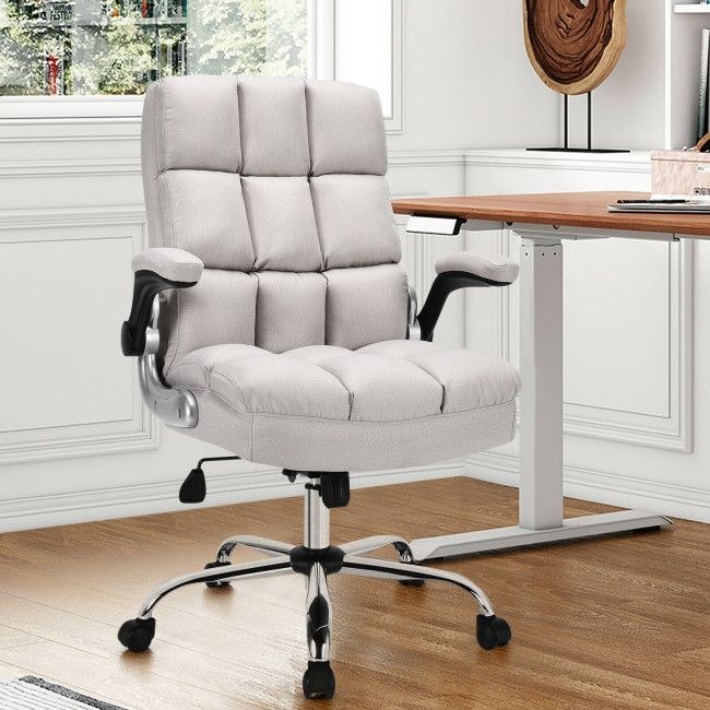 Adjustable high-back office chair that supports a compact desk arrangement