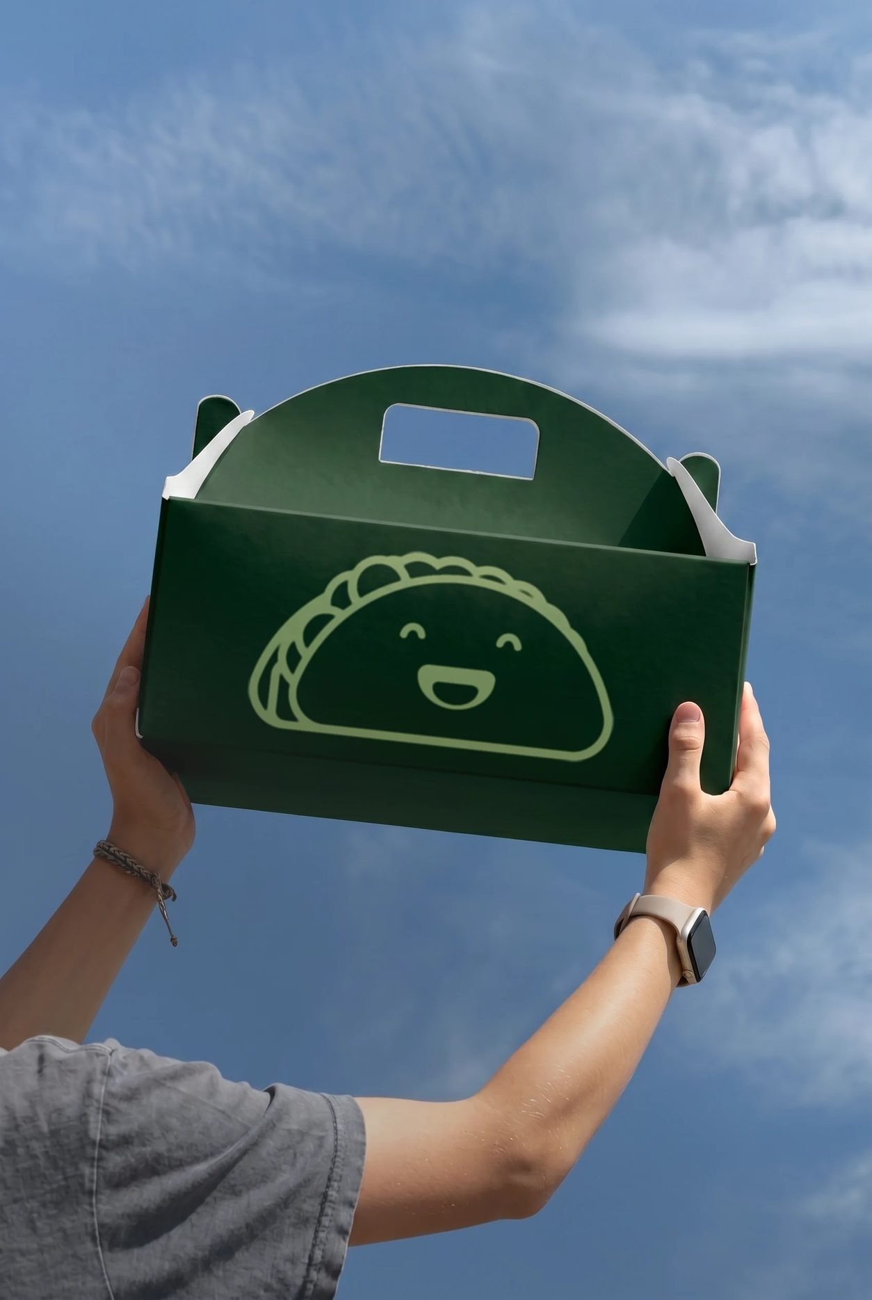 School staff handing off labeled lunch bags