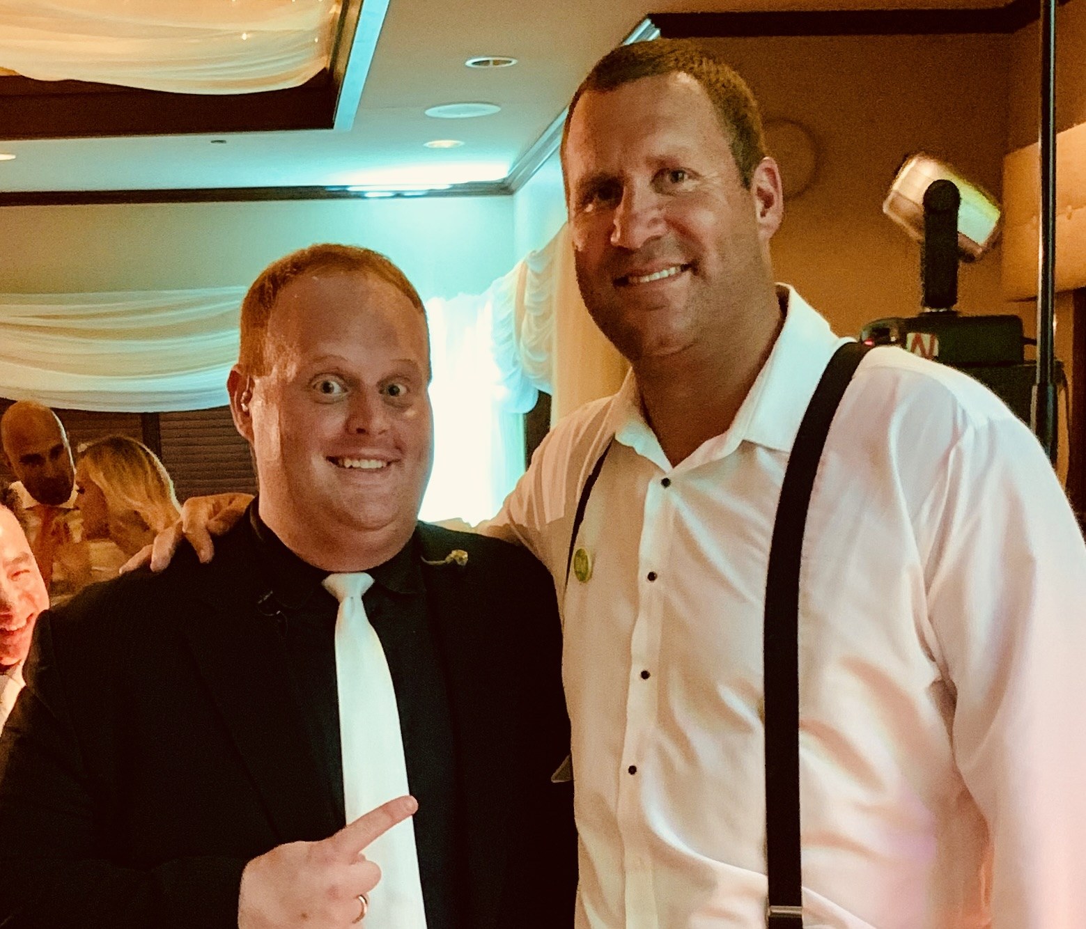 Joshua S. Walker with a fellow entertainer at a wedding reception