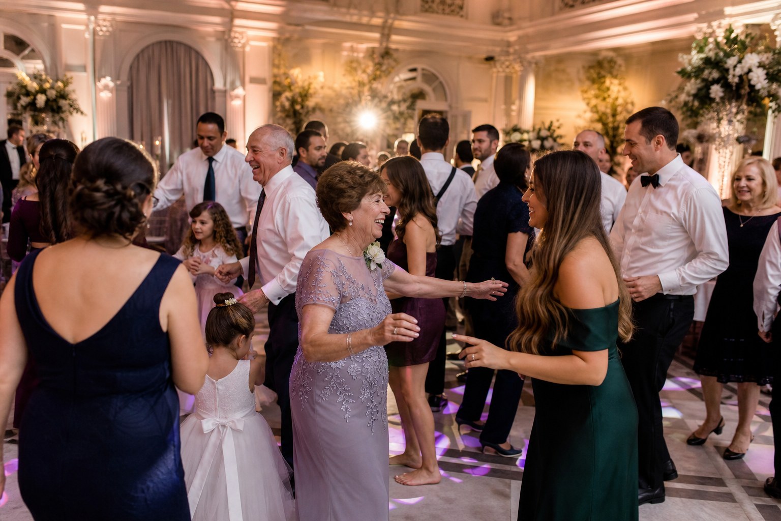 Wedding guests beginning to fill the dance floor