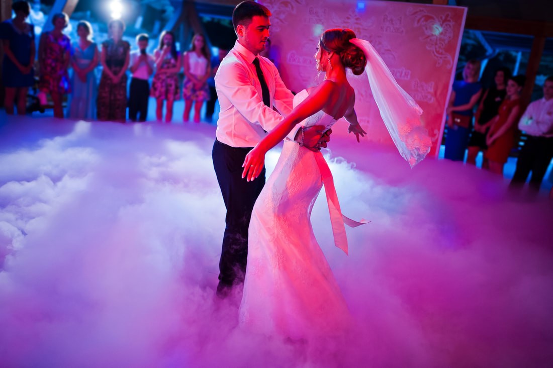 Wedding guests celebrating on the dance floor