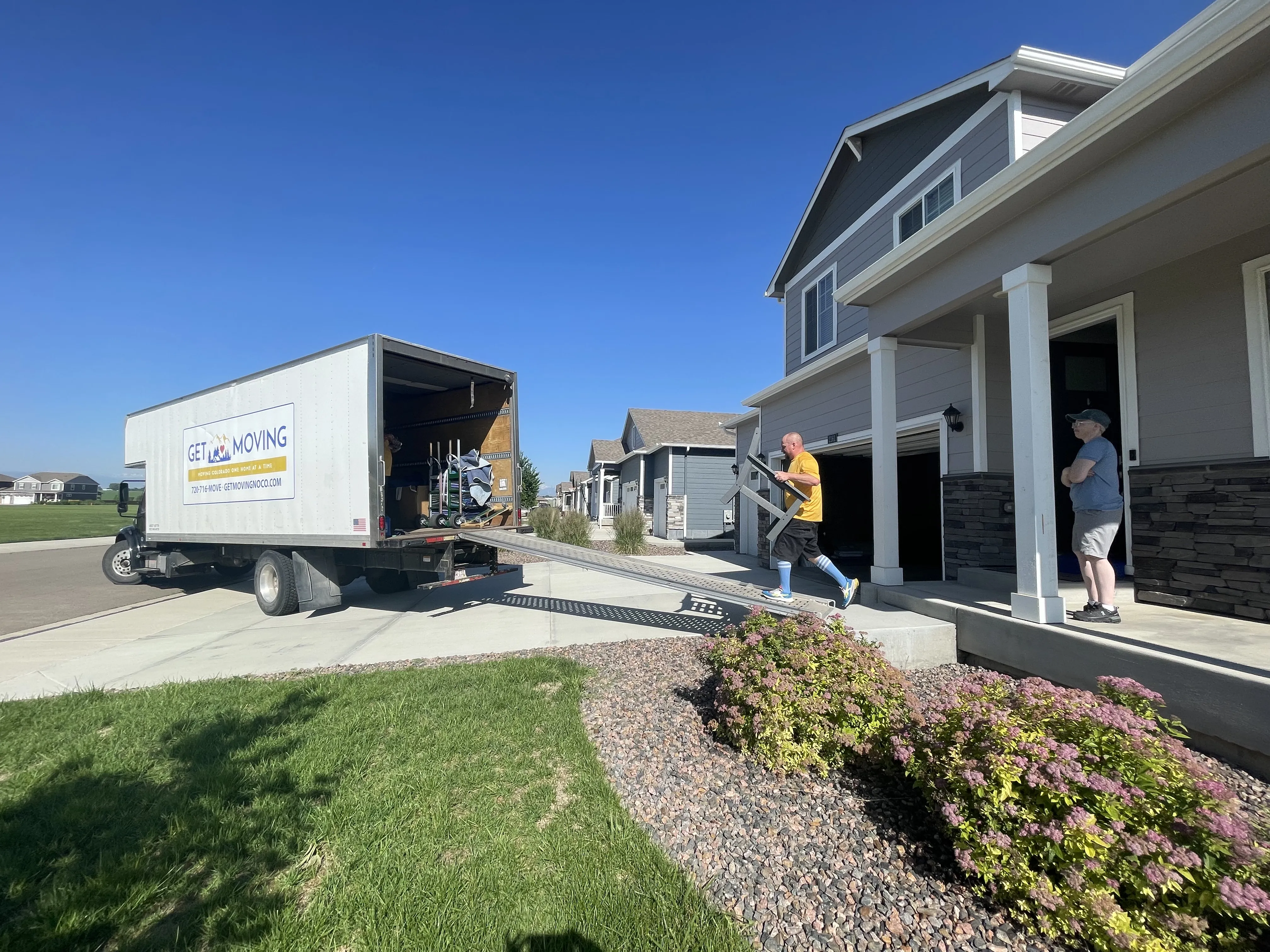 Get Moving crew handling furniture on moving day