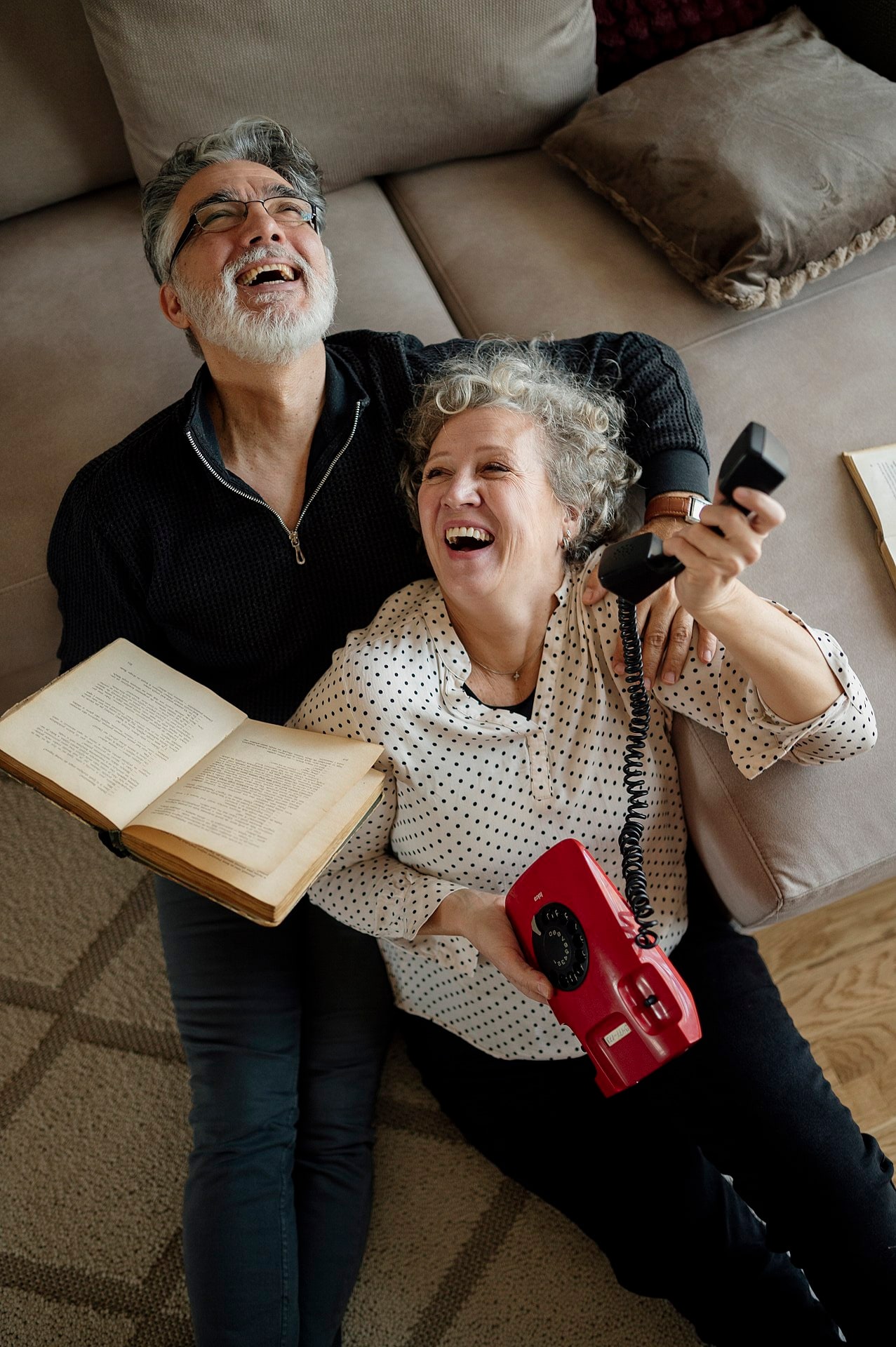 A couple sharing a lighthearted moment together at home