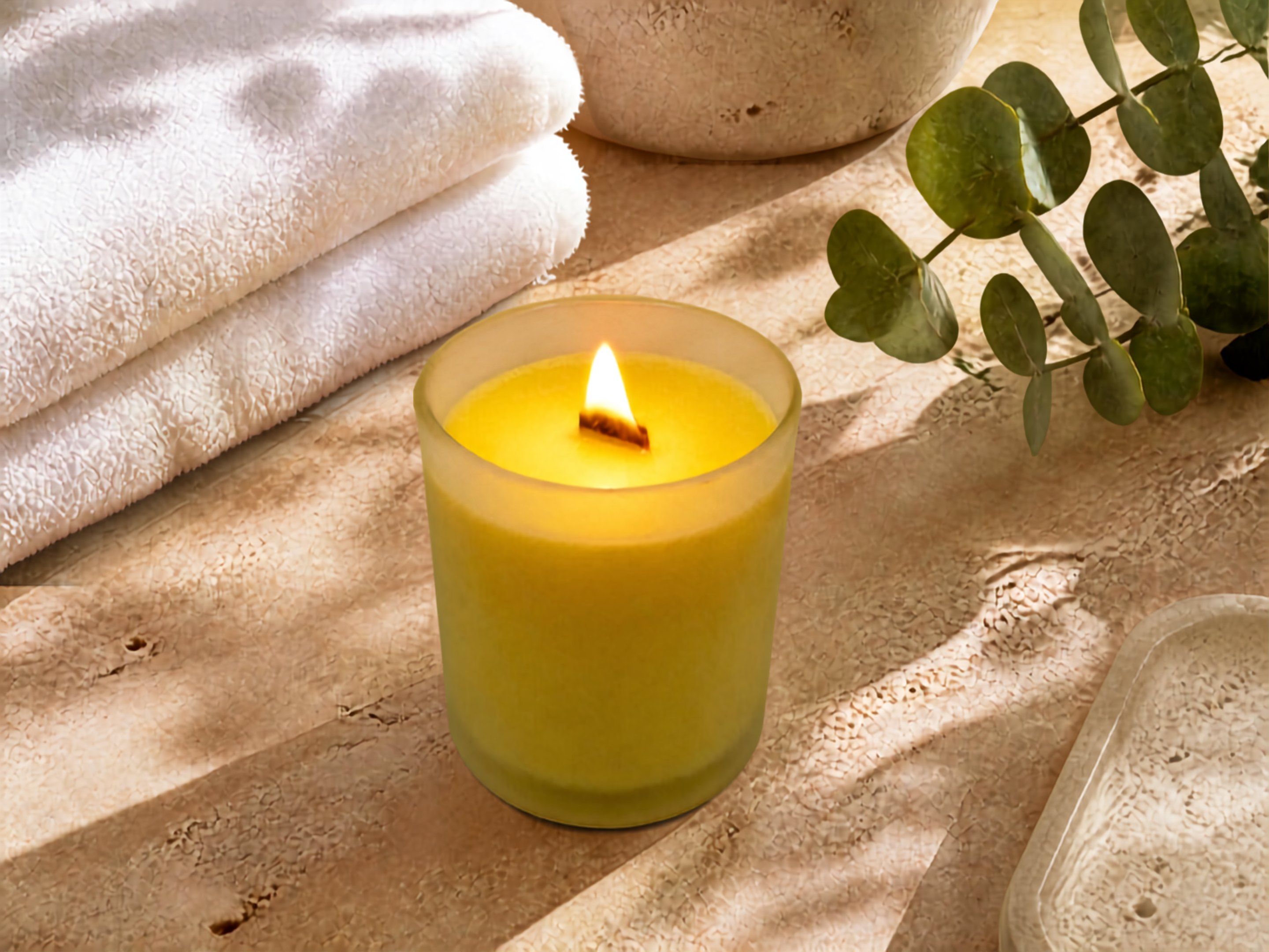 Sunlit Grove candle with bright citrus and green notes
