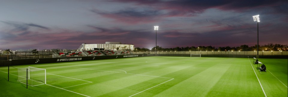 Floodlit football pitches featured in the Arabian Falcons facilities brochure