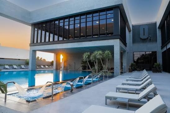 Pool and accommodation facilities featured in the Arabian Falcons brochure