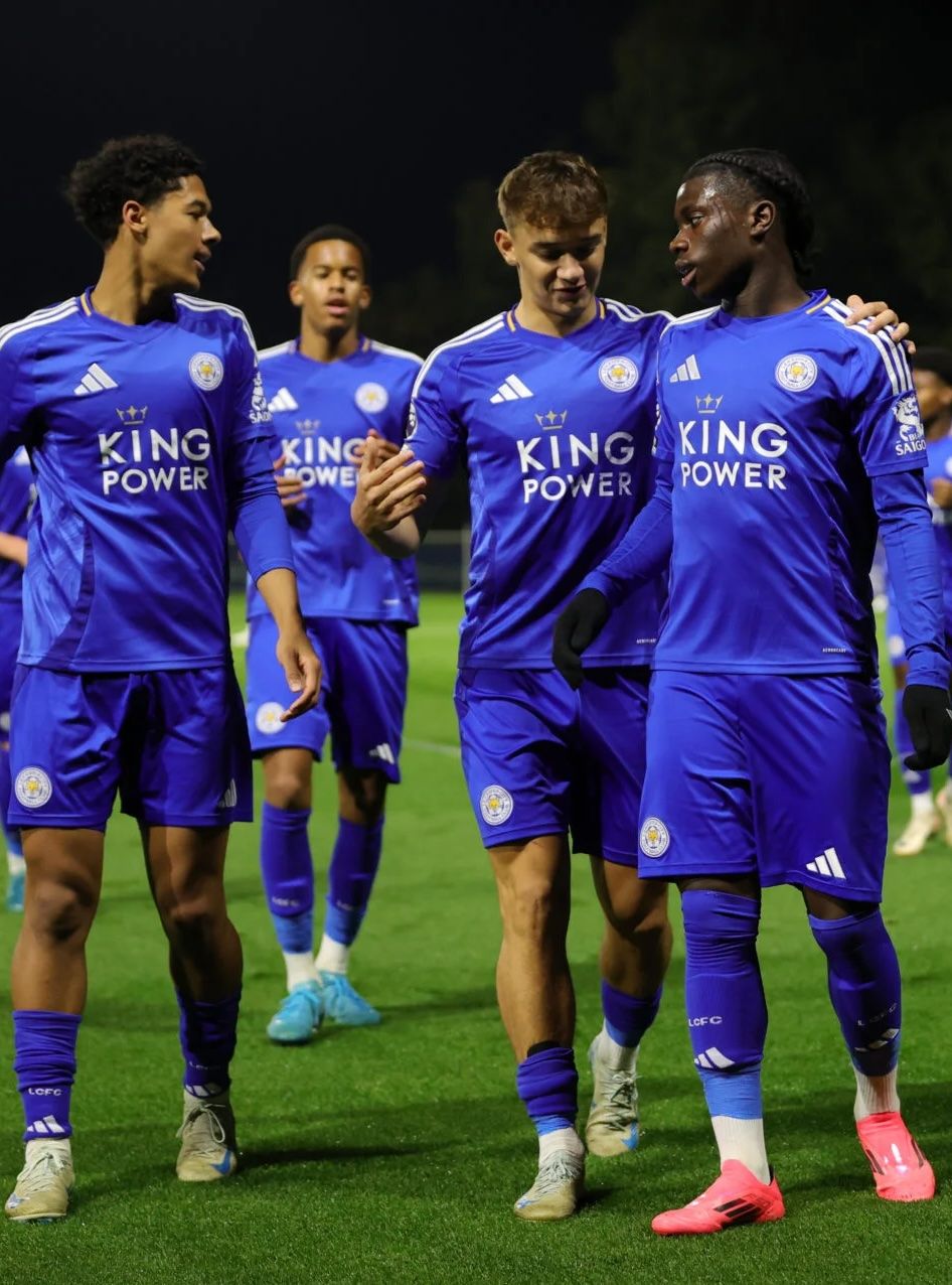 Leicester City players together on the soccer field