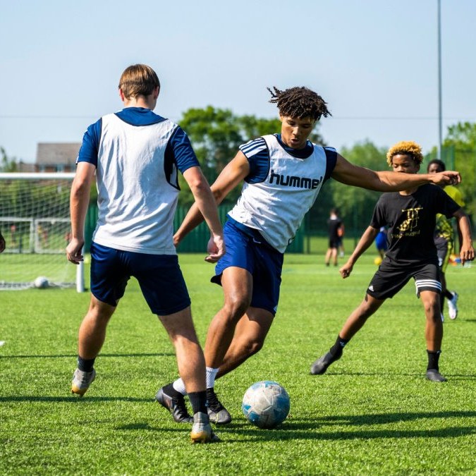 Brooke House Academy student-athletes training on the soccer field