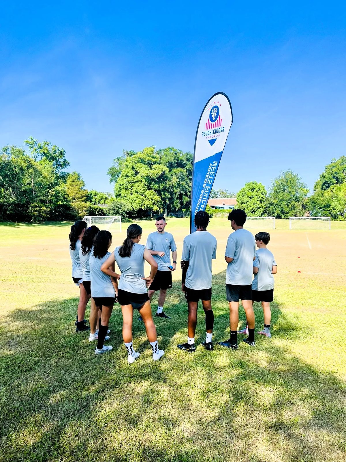 Brooke House Academy student-athletes on the soccer field