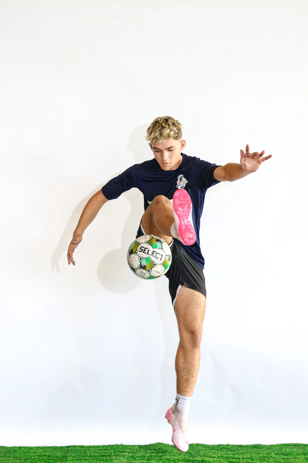 Brooke House student-athlete training with a soccer ball