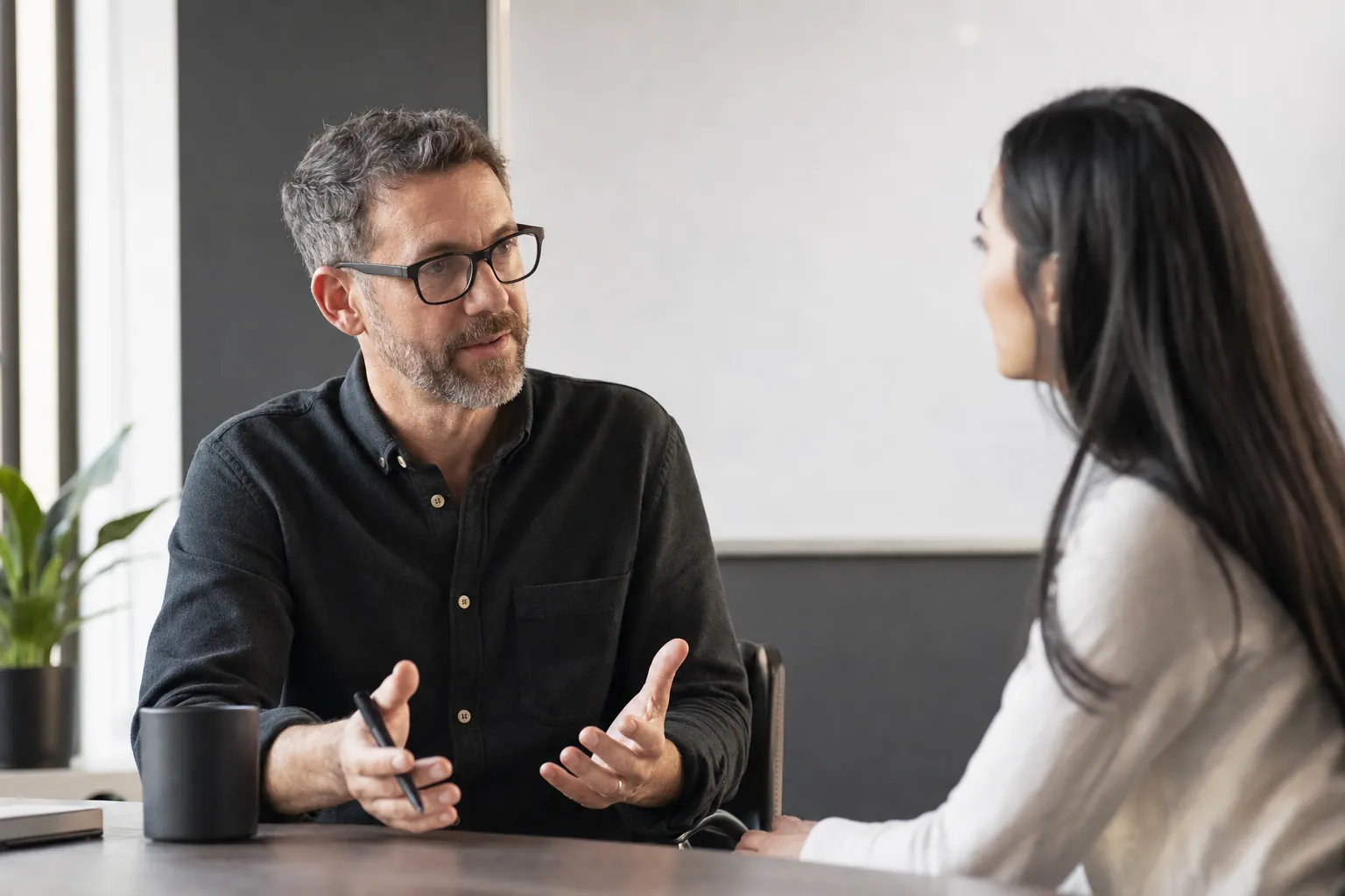 Two colleagues having a direct work conversation