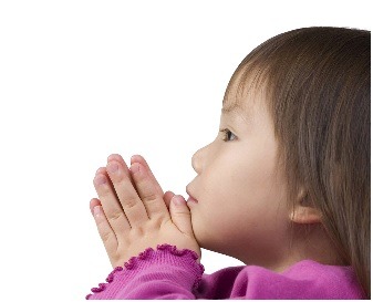 A young girl praying
