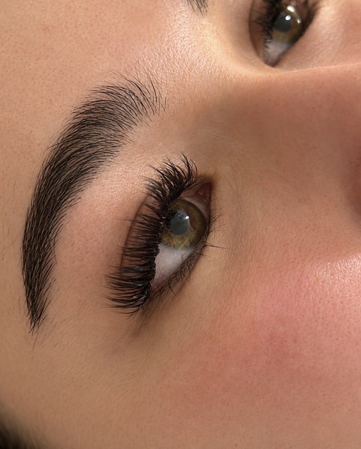 Close-up of a client’s finished lash extensions