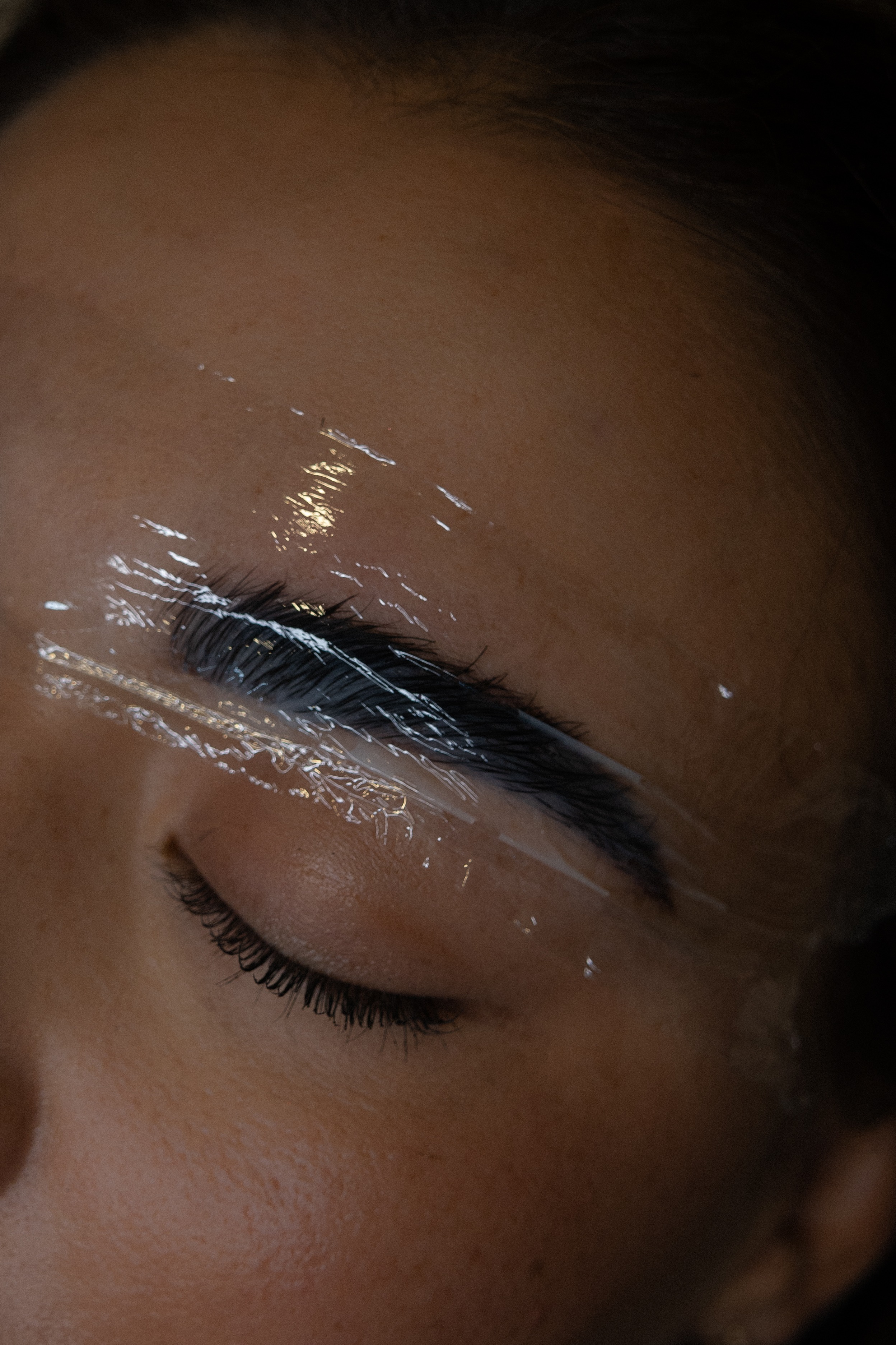 Close-up of an eyelash treatment in progress