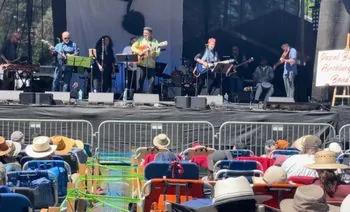 Pascal Bokar AfroBlueGrazz Band performing at an outdoor music festival