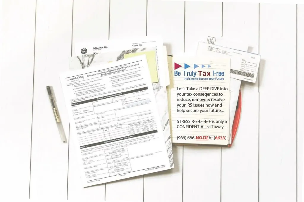 Tax documents and Be Tax Debt Free preparation materials