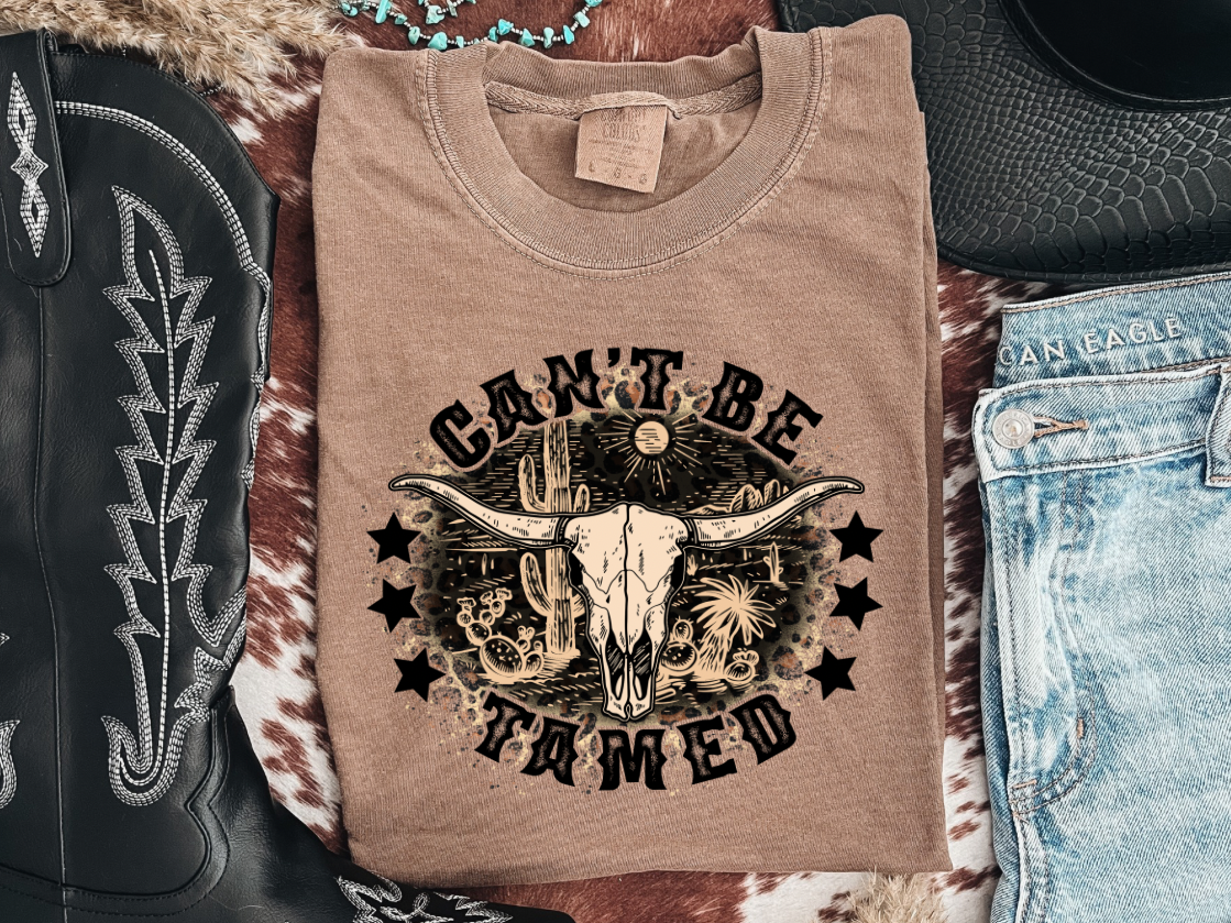 Can’t be tamed graphic top