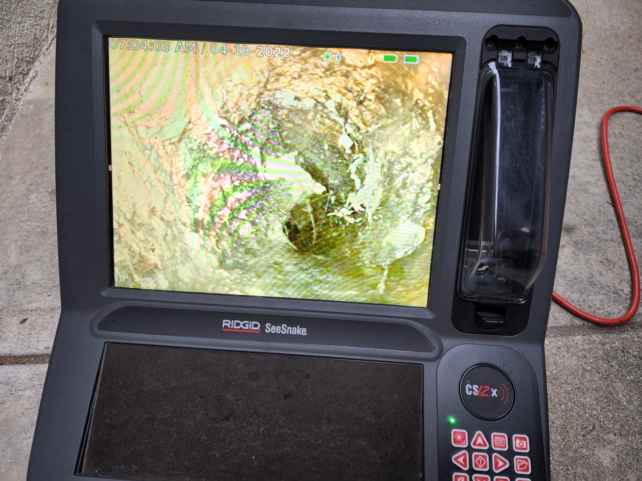 Sewer inspection monitor showing the inside of a line during an Anytime Jetting field job