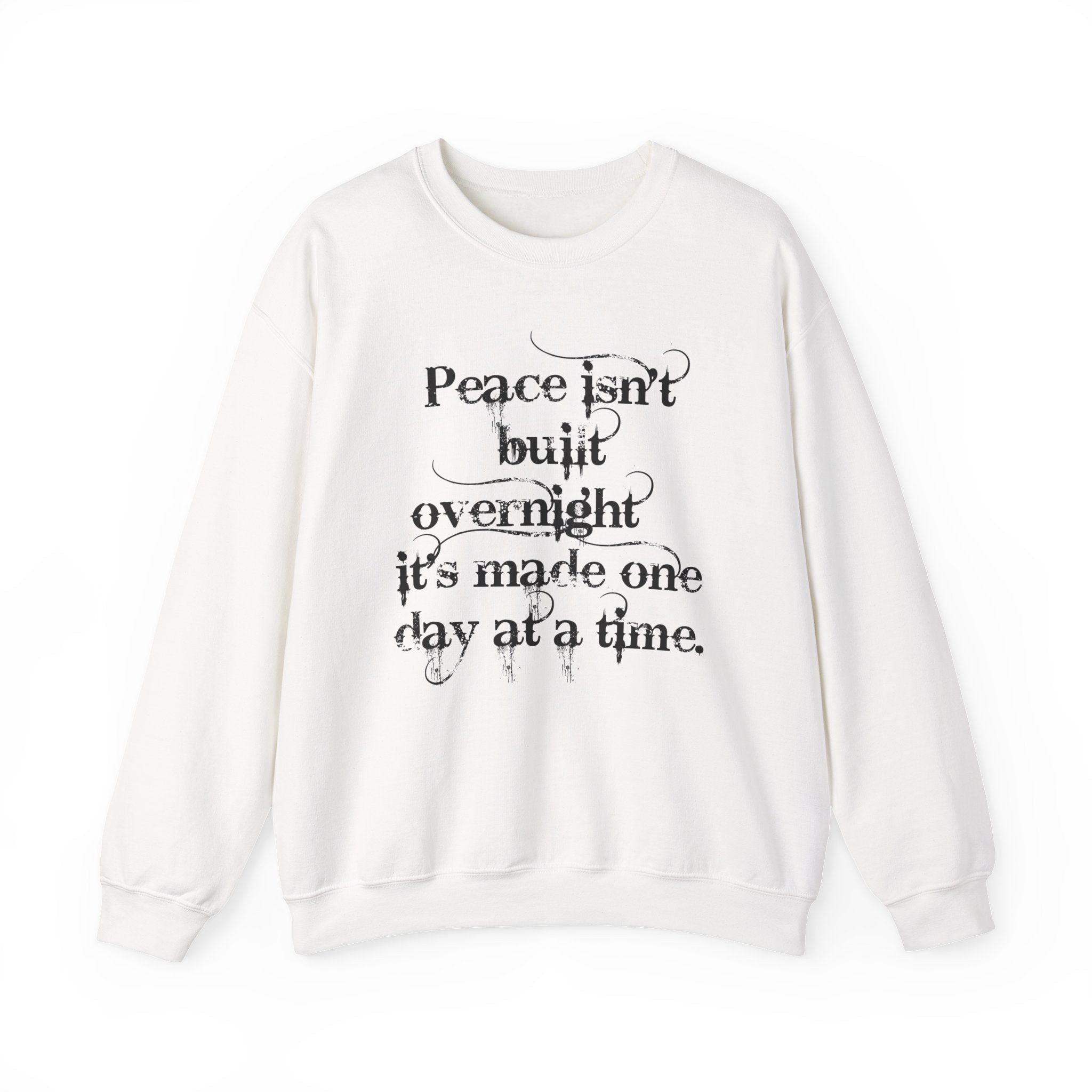 Crewneck Sweatshirt - "Peace isn't built overnight, it's made one day at a time" Inspirational Quote