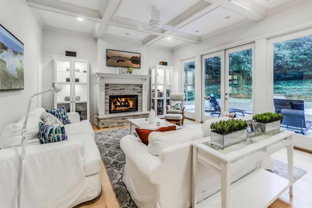 Living room with fireplace, before the professional reshoot
