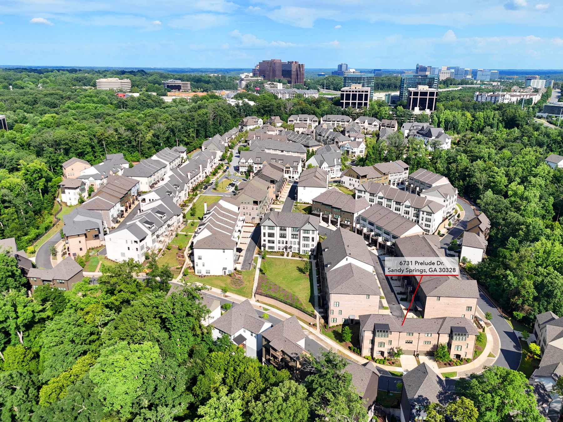 Aerial view of a Sandy Springs townhome community with 6731 Prelude Drive marked in the foreground