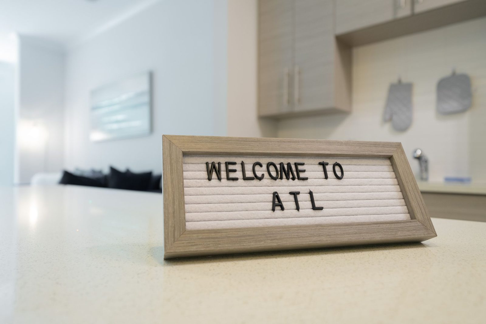 A sign that says welcome to atl on it