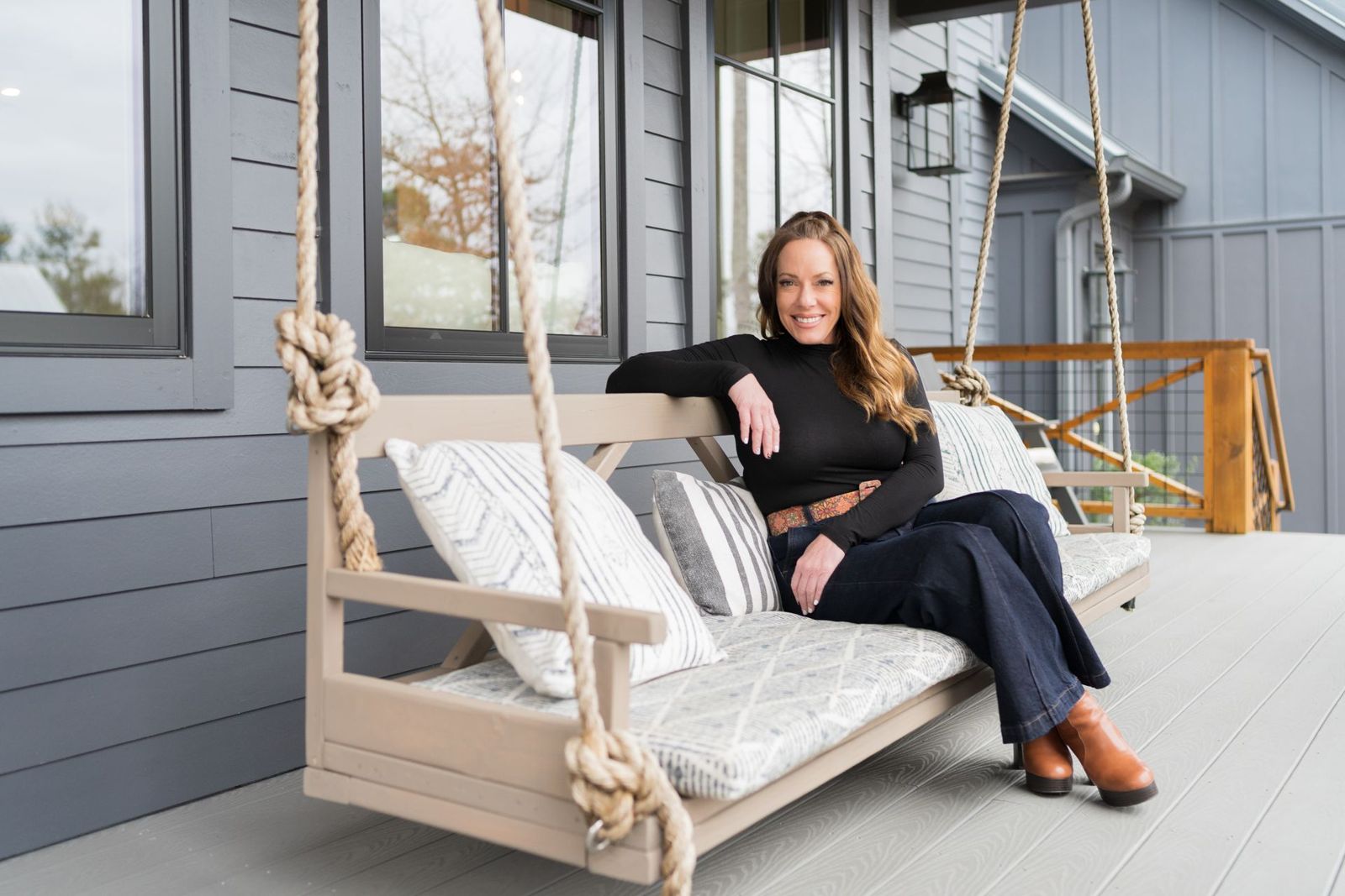 Lifestyle branding portrait on a porch swing