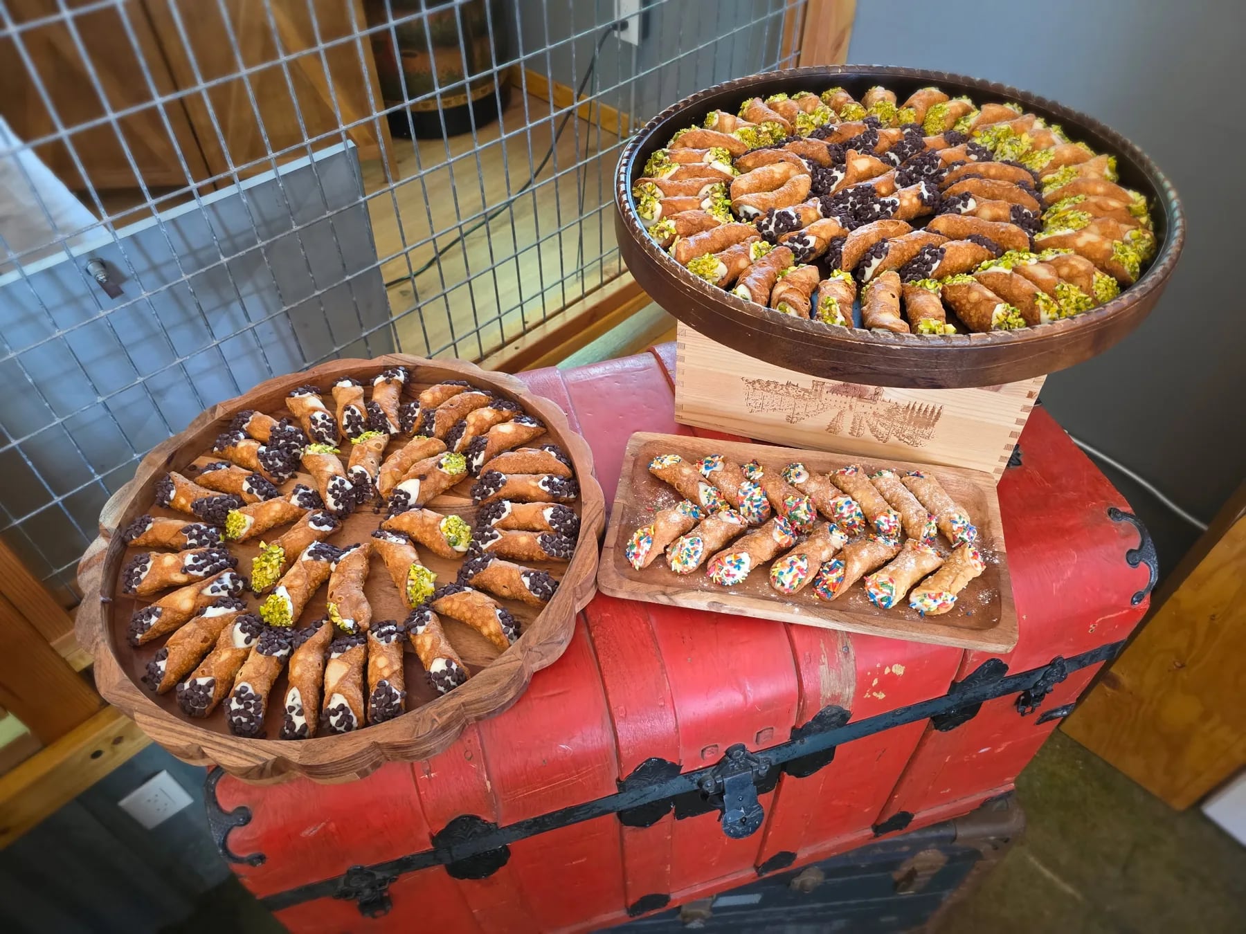 Cannolis and dessert bites arranged for a wedding dessert bar