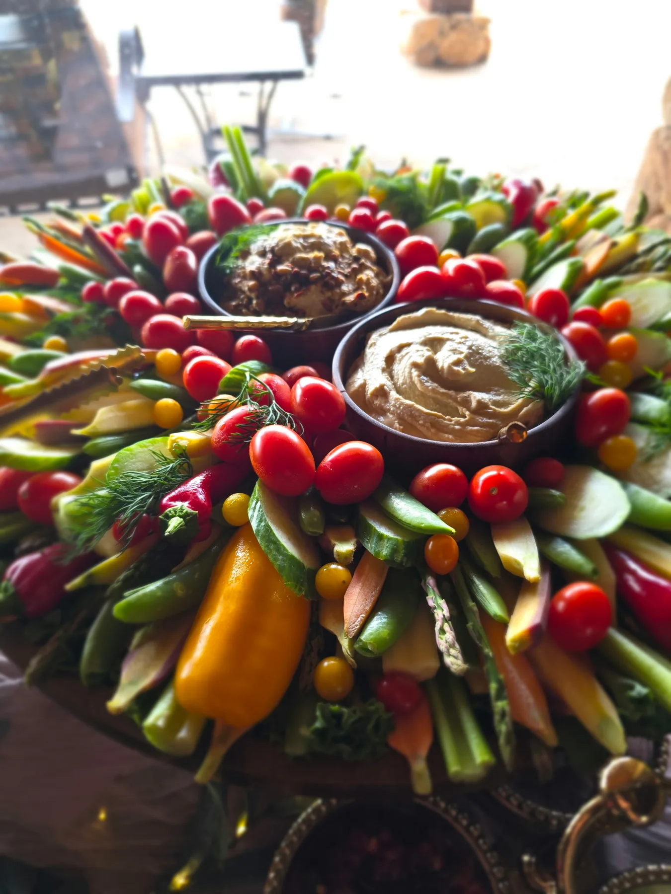 A dramatic vegetable platter with a dip centrepiece