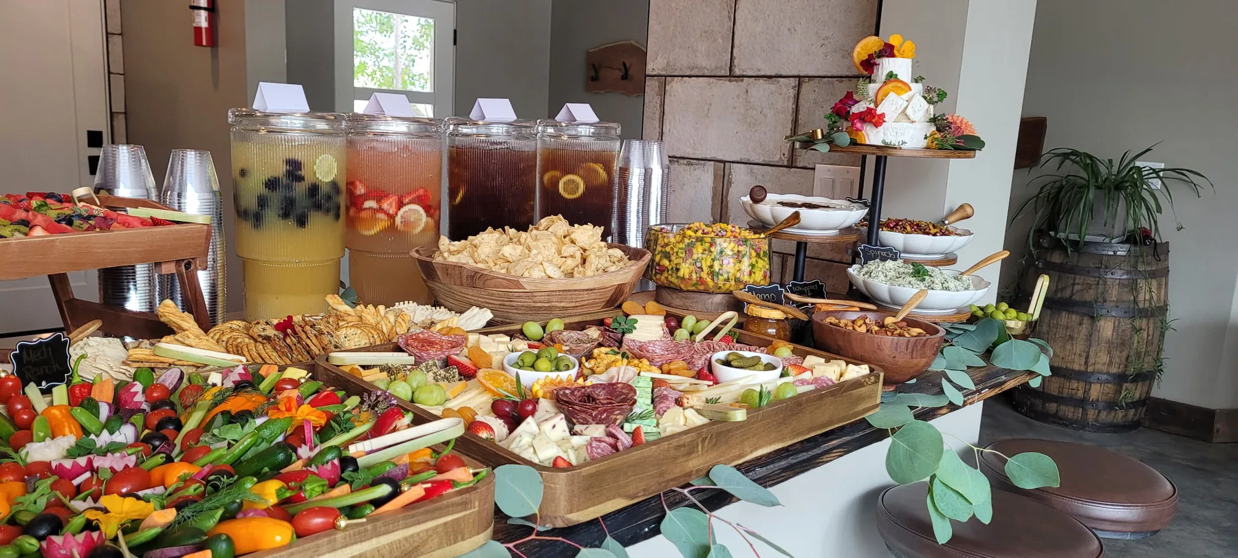 A long grazing table set for guests