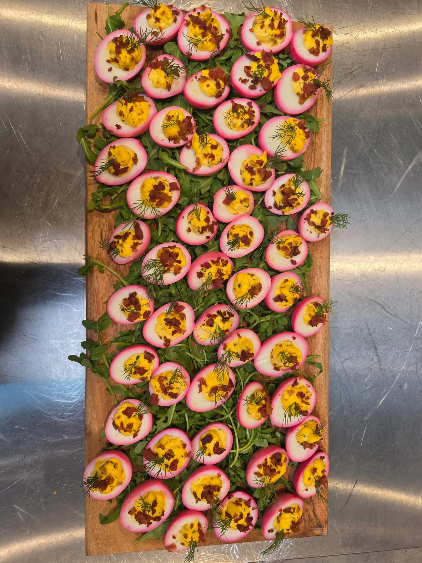 Small appetizer cups arranged on a serving tray