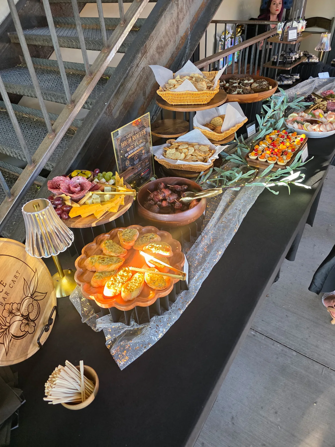 A styled event spread with grazing food